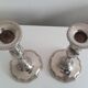Pair of silver-plated metal candlesticks