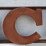 Rock rusty metal sign