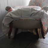 pair of toad armchairs in floral fabric.