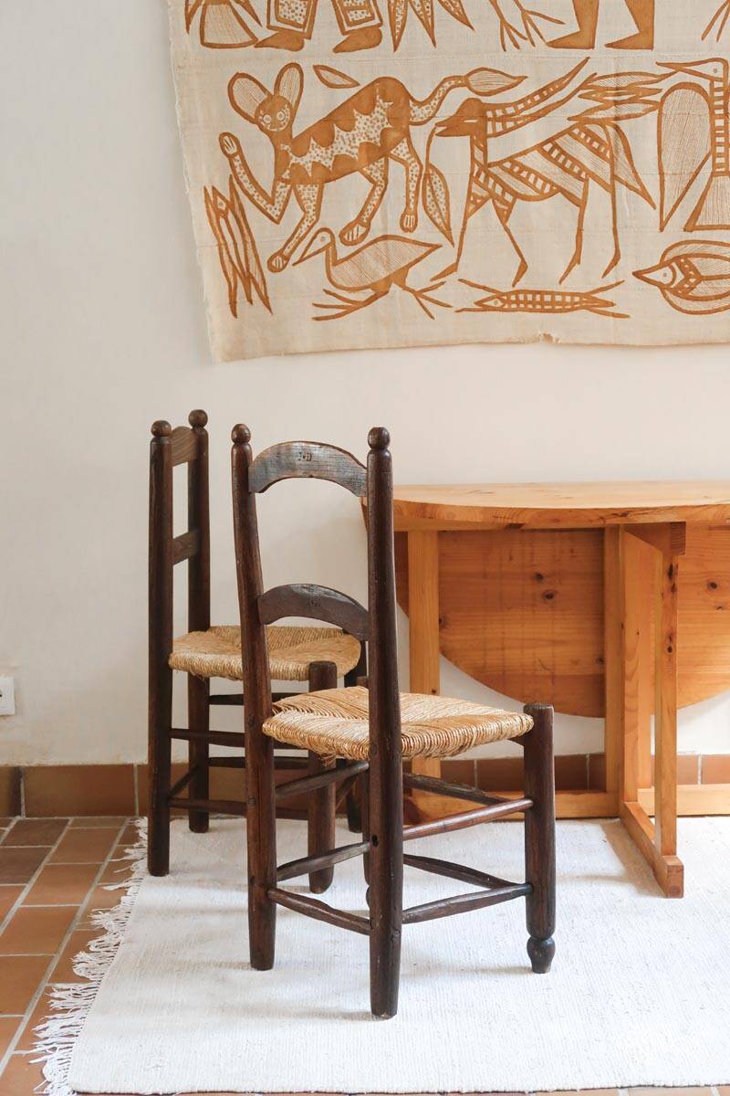 Pair of straw farm chairs