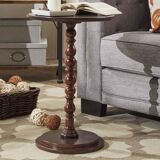 Round wooden tables with carving