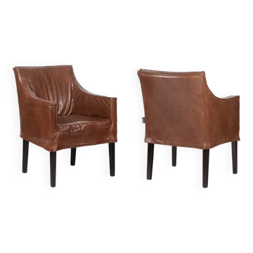 Lintello. Pair of camel leather armchairs. 1970s.