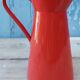 Red enamelled broc