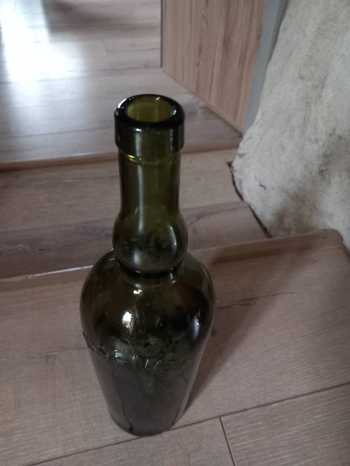 Old thick glass bottle