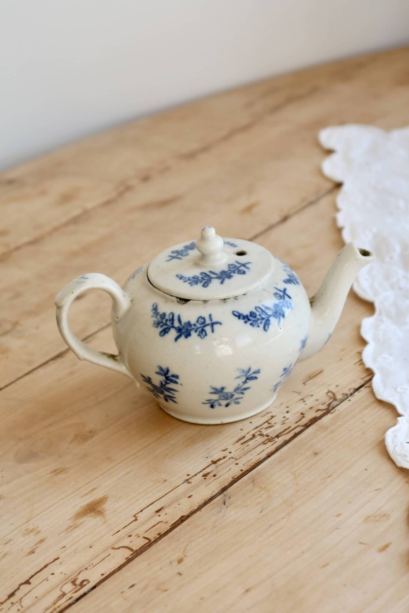 Antique teapot Saint-Uze steel clay with cobalt blue floral decoration.