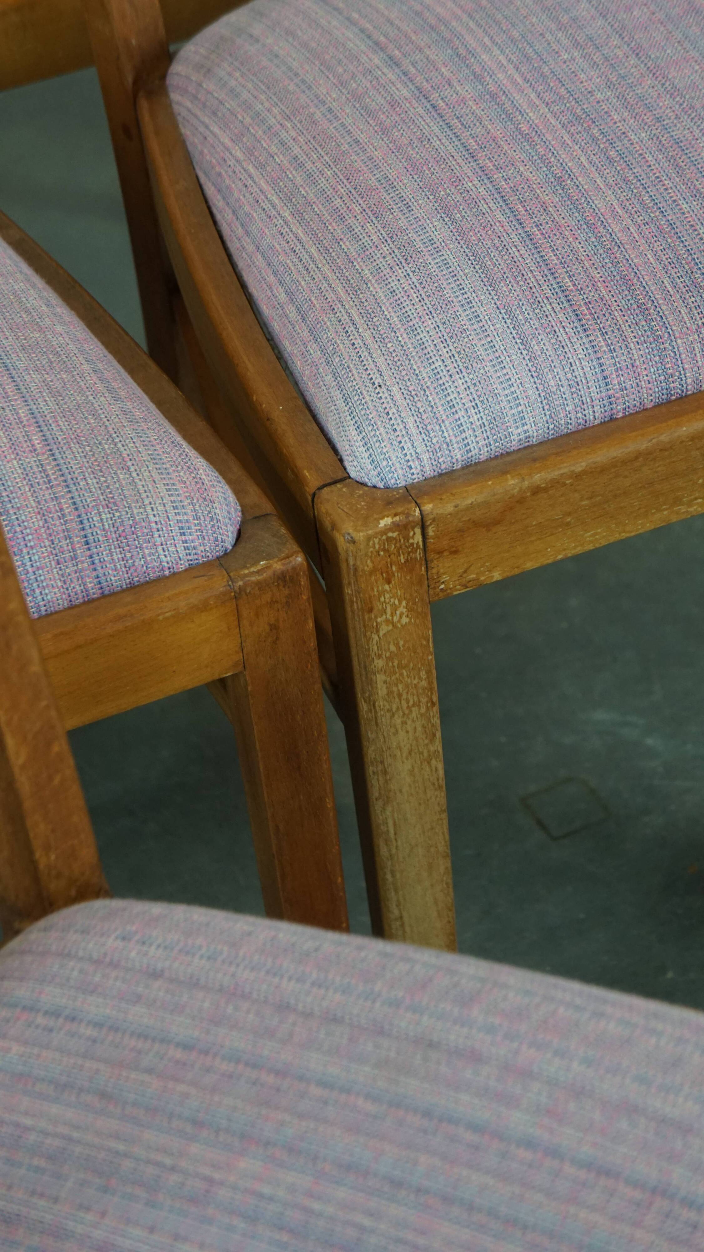 Set of 8 vintage Danish design dining chairs from the 1970s with light purple fabric seats