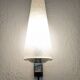 Modernist wall light in glass and brass by Maison Arlus, France circa 1950.