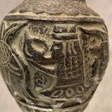 Terracotta vase with green digging patina with animal decoration