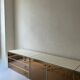Low ivory lacquered enfilade, smoked mirror & brass JC Mahey, design 1970.