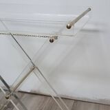 Folding side table in plexiglass and brass, 1970s.