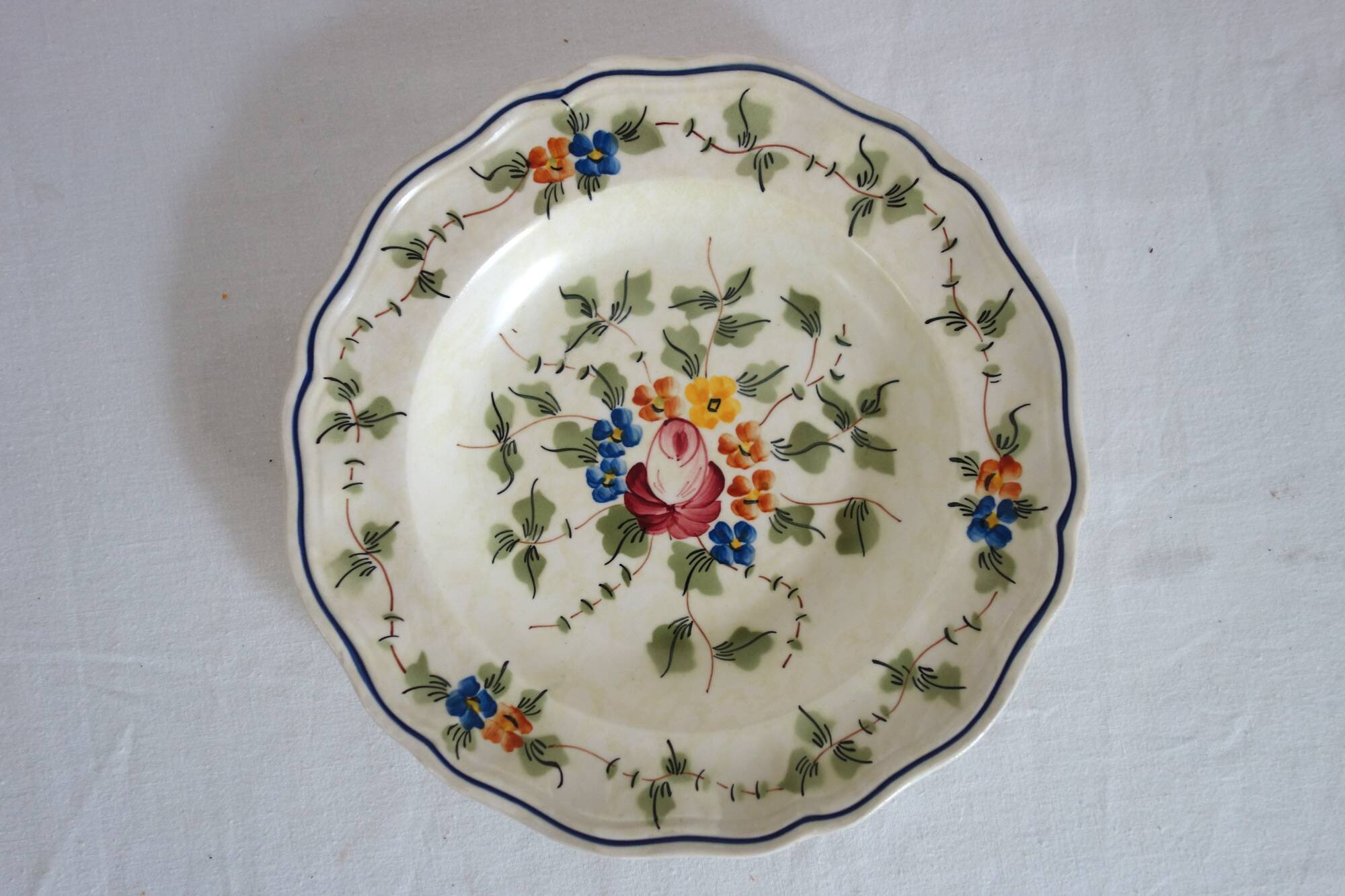 12 old Longchamp hollow plates with floral decoration