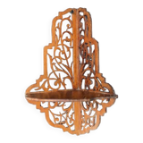 Old wall corner shelf in cut wood from the 1900s