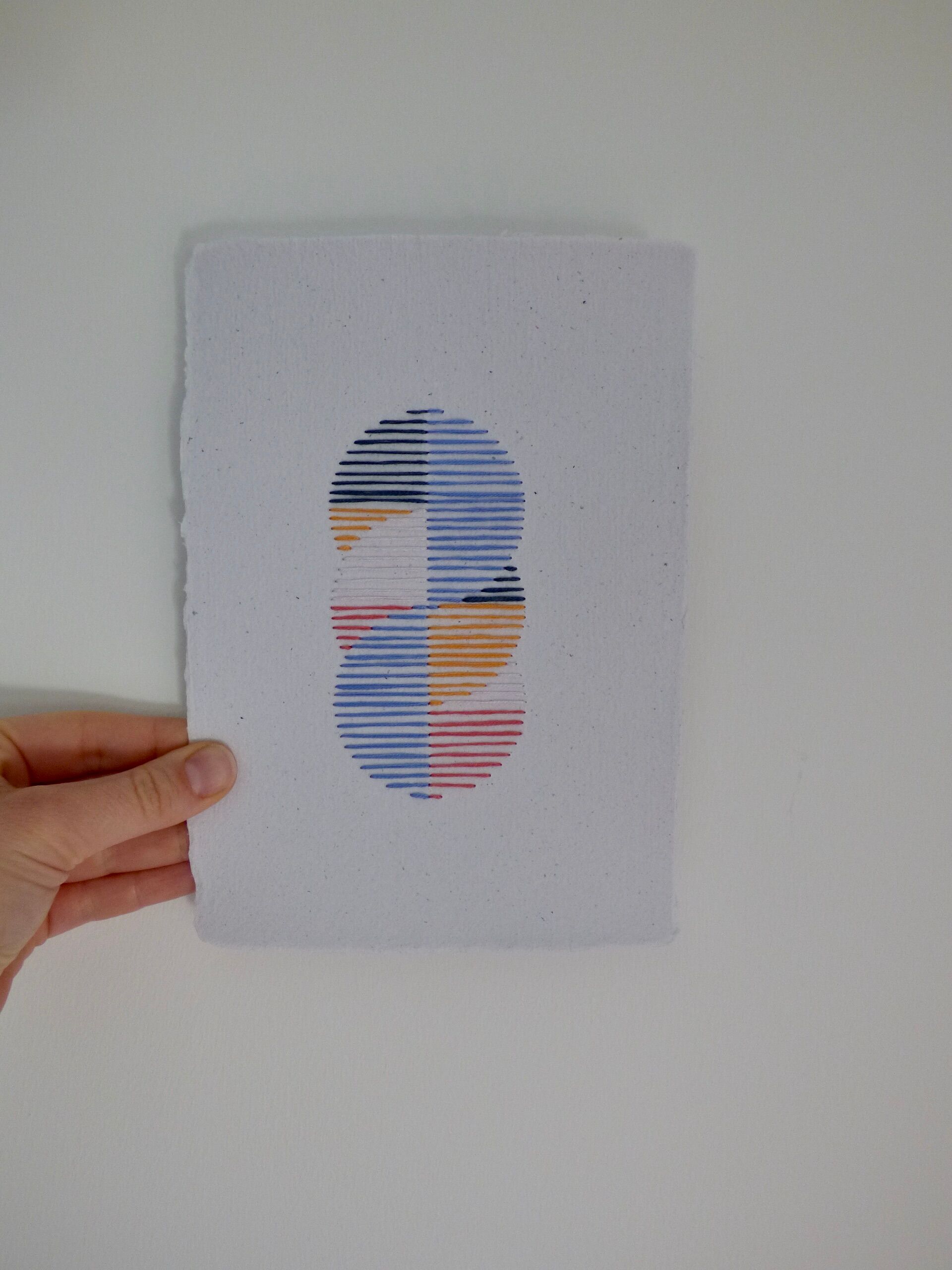 Embroidery on rag paper