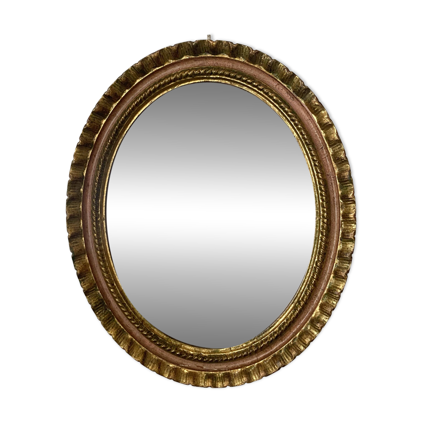 Oval Florentine mirror in powder pink and gold wood, 1960s.