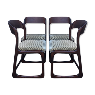 Suite de quatre chaises modèle "traineau" Baumann