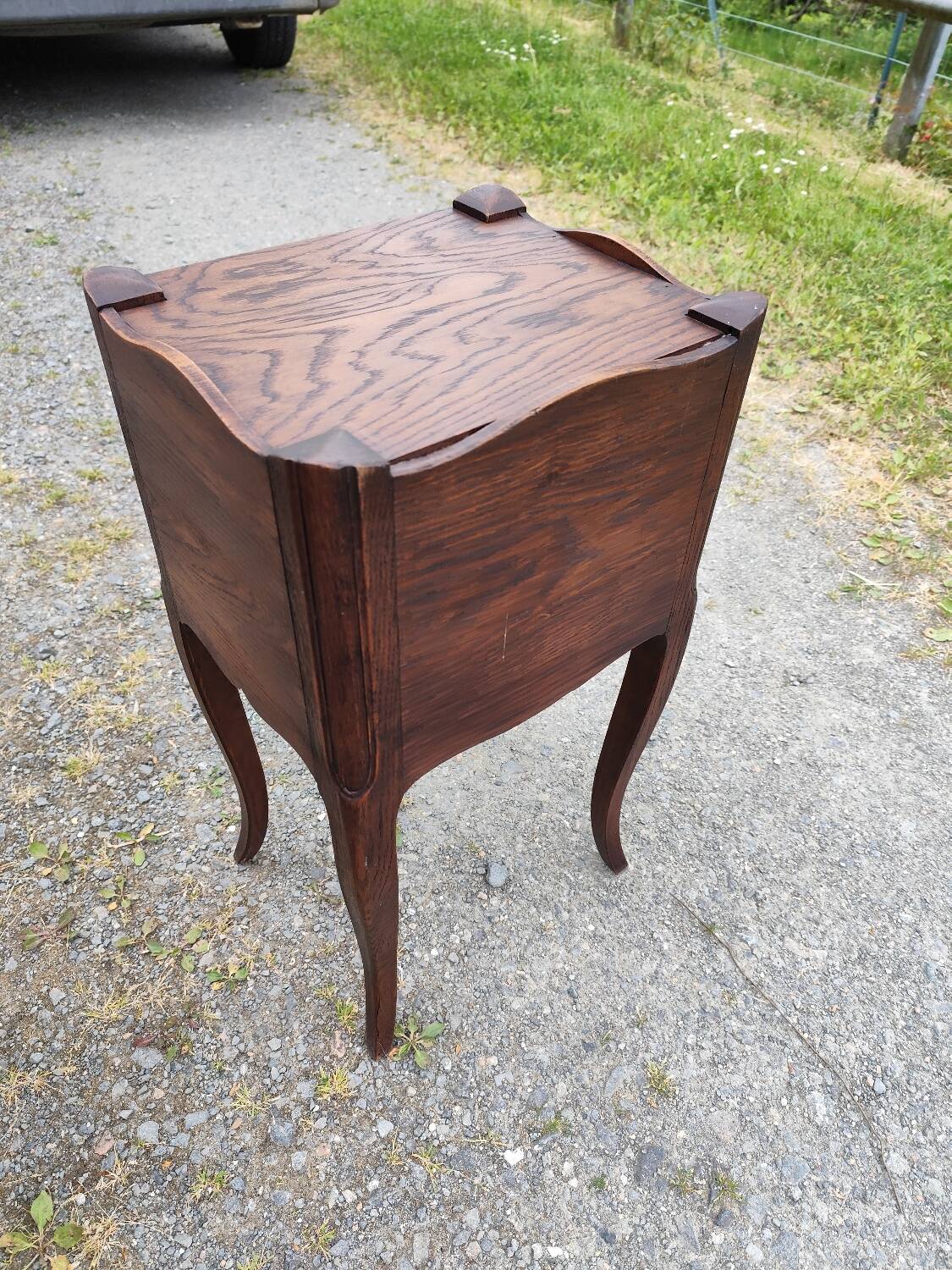 Pair of oak bedside tables with curtained niche doors
