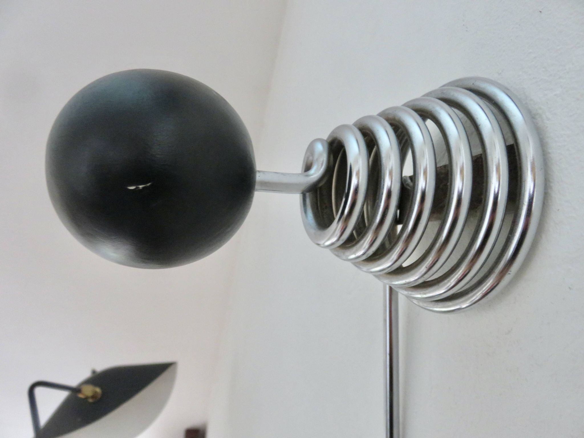 "Streamline" wall coat rack in chromed metal and black lacquered wood, 1970.