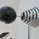 "Streamline" wall coat rack in chromed metal and black lacquered wood, 1970.