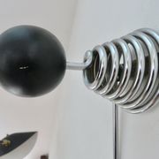"Streamline" wall coat rack in chromed metal and black lacquered wood, 1970.