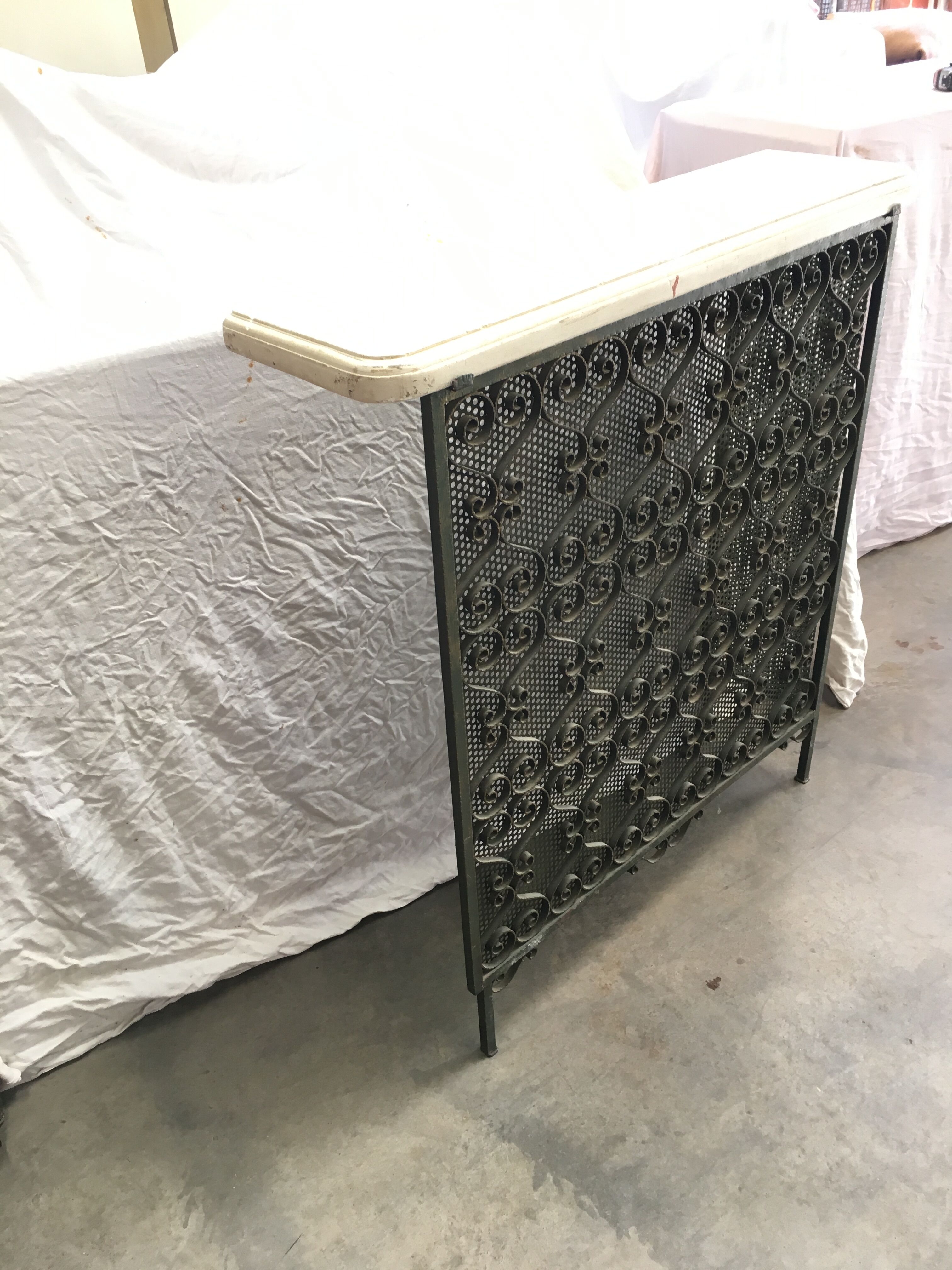 Wrought iron radiator cover