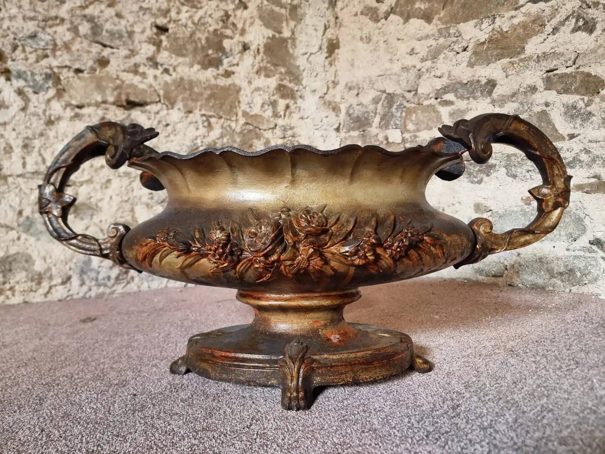 Large antique cast iron planter on a stand, brown-gold patina, France, circa 1900.