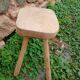 Antique stool in raw wood