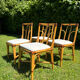 Suite de 4 chaises vintage en bambou et rotin – style années 70