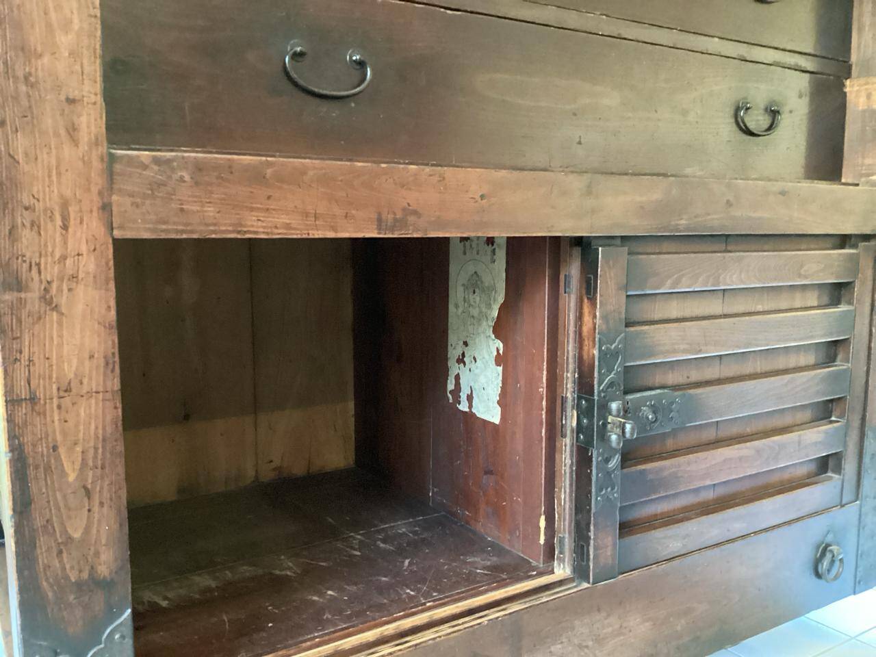 Japanese antique wooden chest with black fittings.