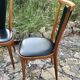 Four vintage beech and skai chairs