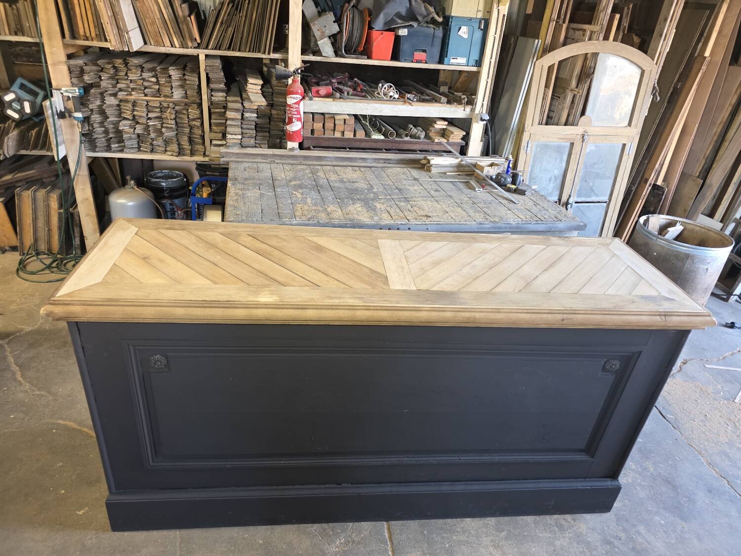 Chevron-patterned oak workbench