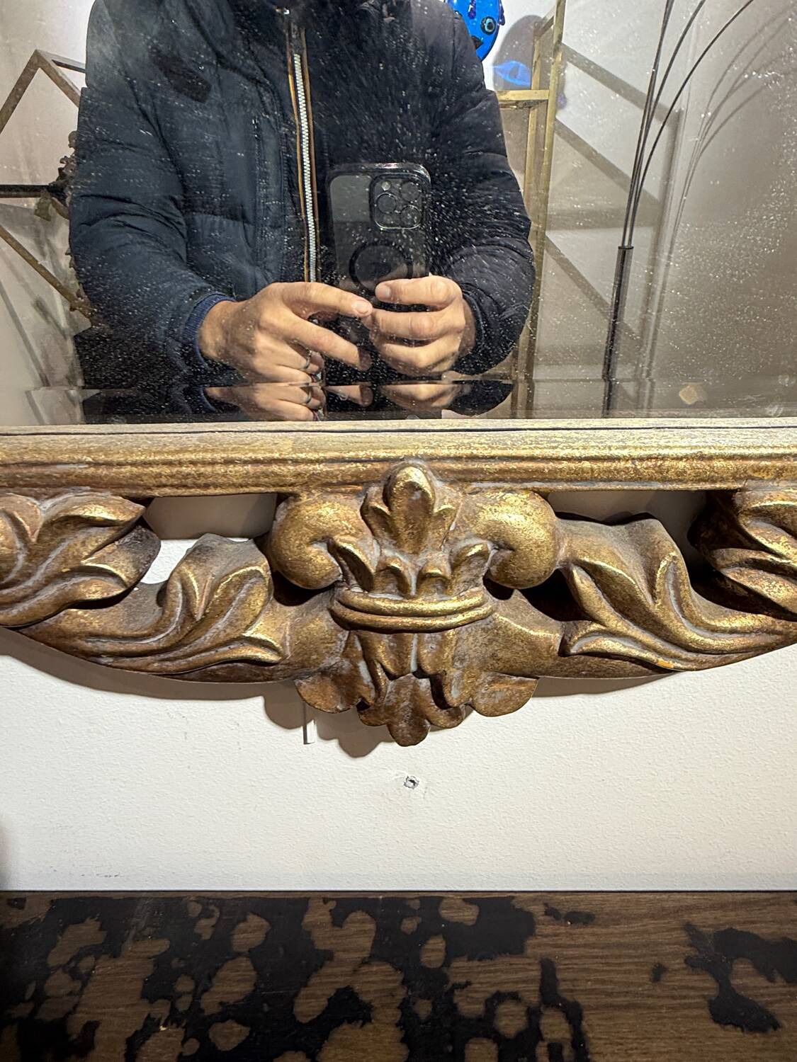 Gold wooden wall mirror with floral decoration