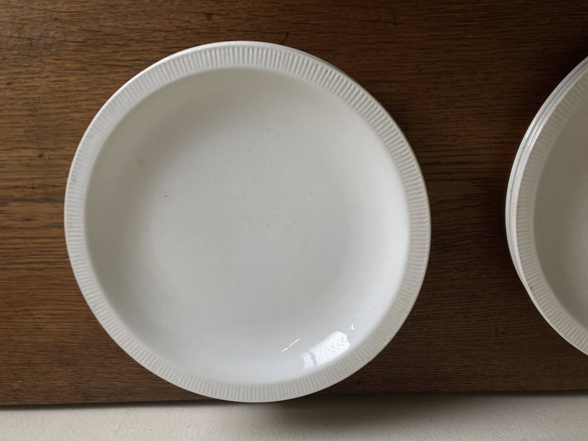 Set of 7 modernist flat plates Lunéville 1930 white earthenware