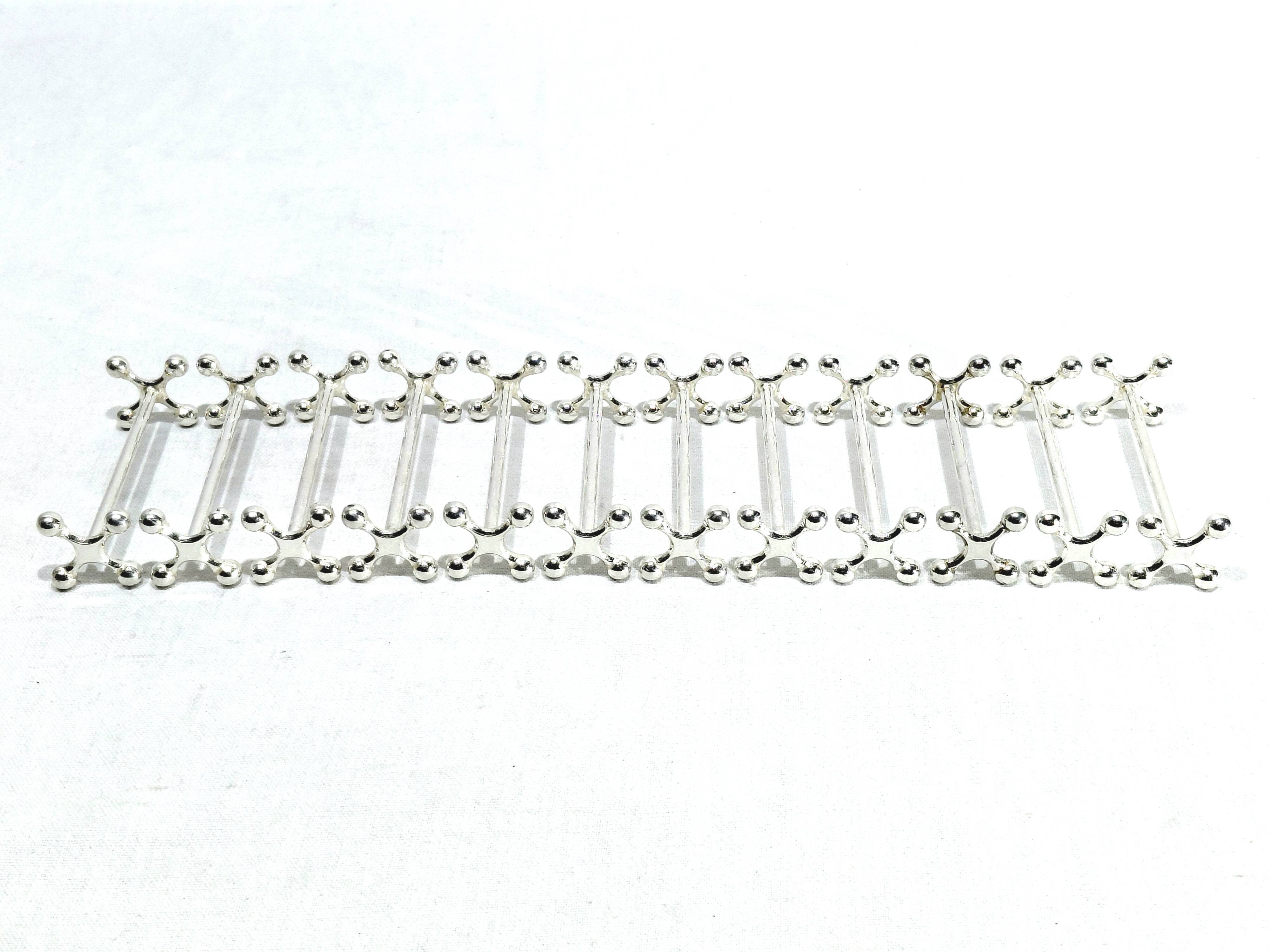 CHRISTOFLE - 12 BALL-END KNIFE RESTS