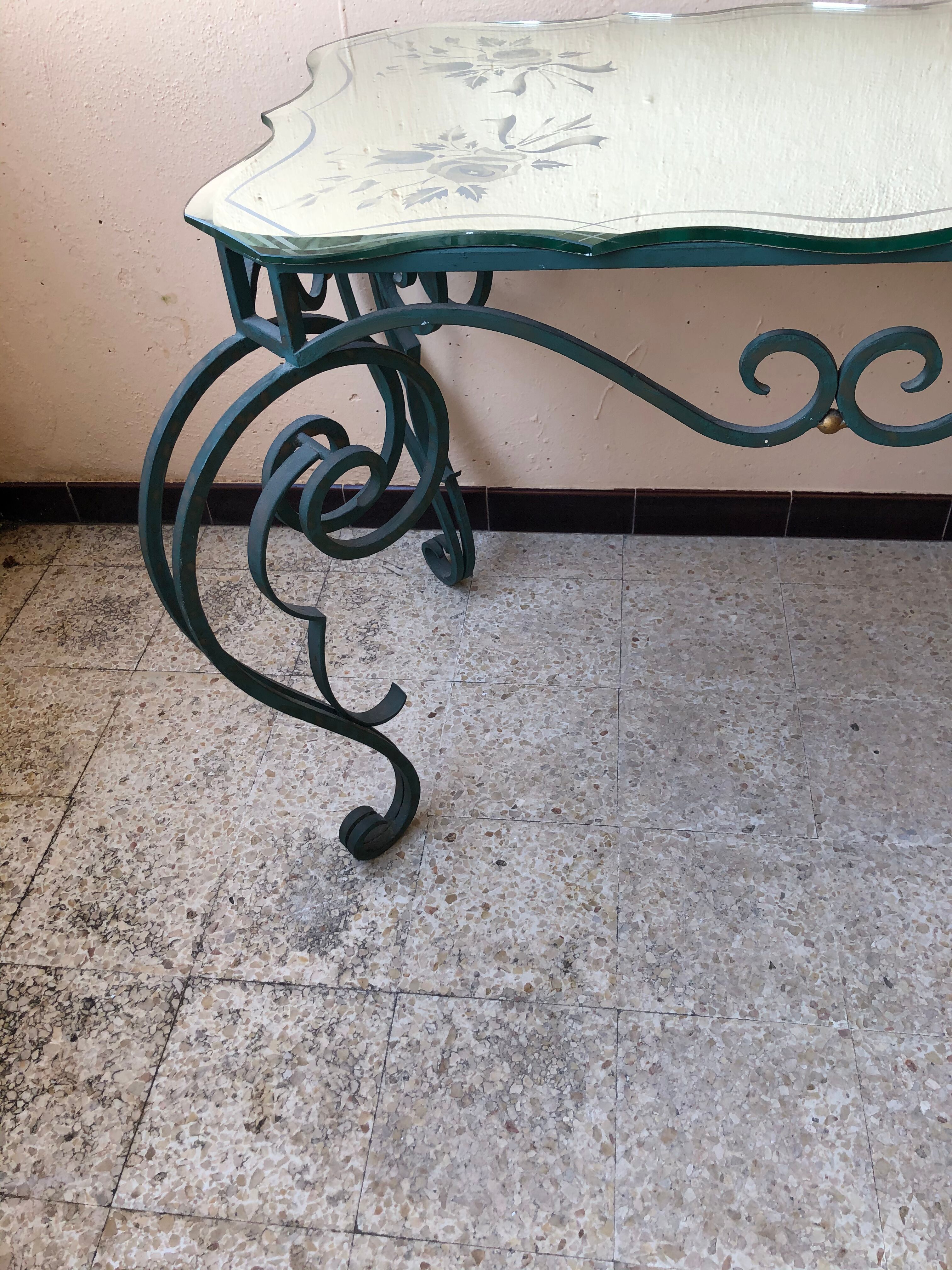 Wrought iron and engraved mirror