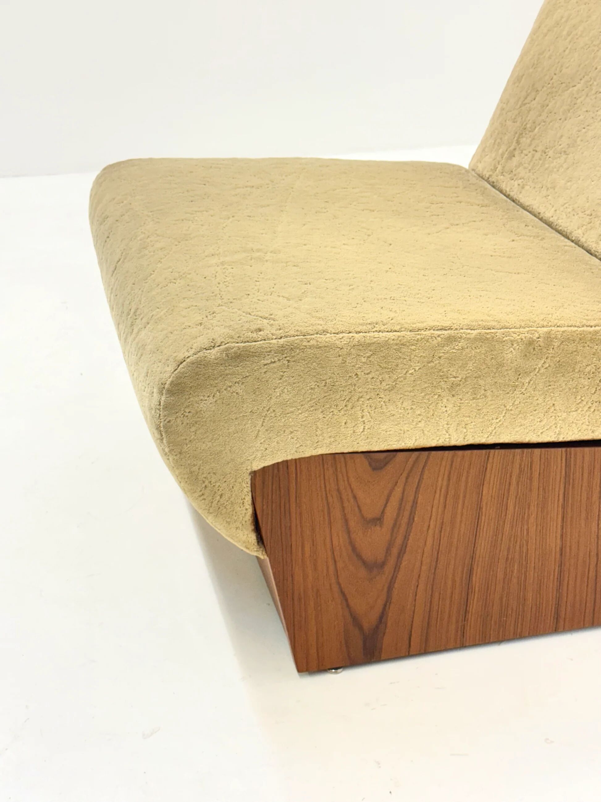 Vintage mid-century beige armchair with wooden frame and ottoman