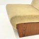 Vintage mid-century beige armchair with wooden frame and ottoman
