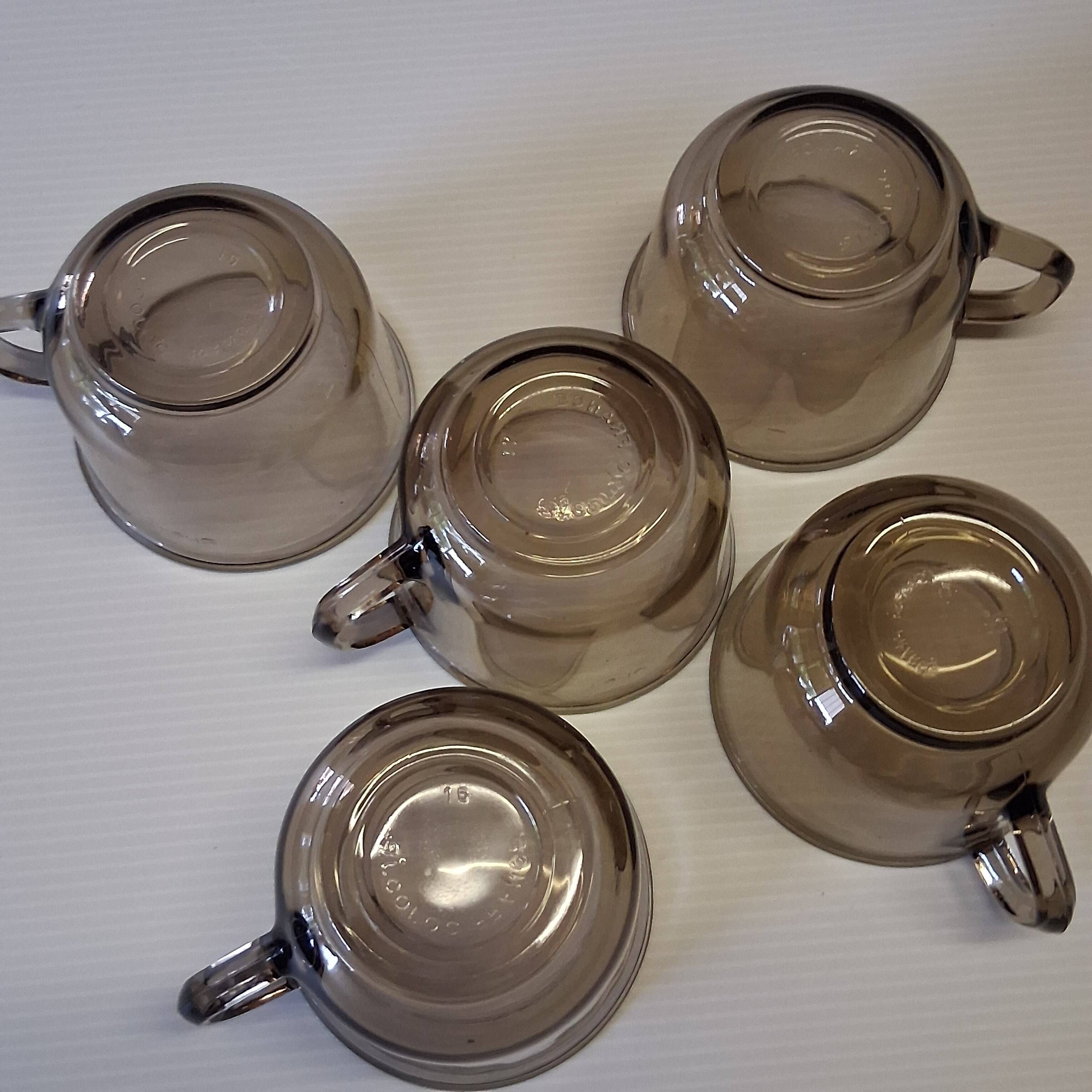 Set of 5 amber black coffee cups from Arcoroc in very good condition.