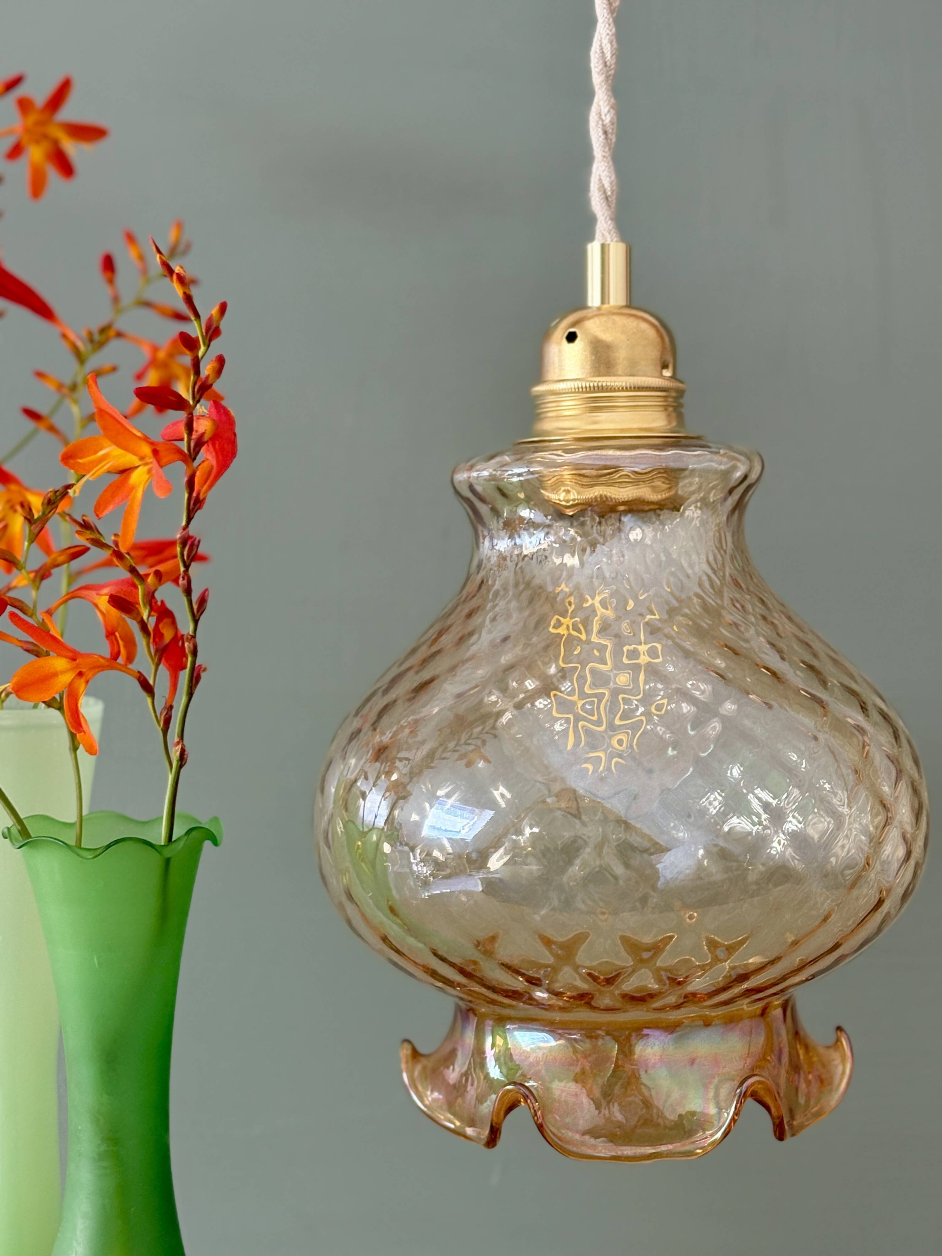 Vintage amber glass suspension globe