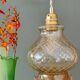 Vintage amber glass suspension globe