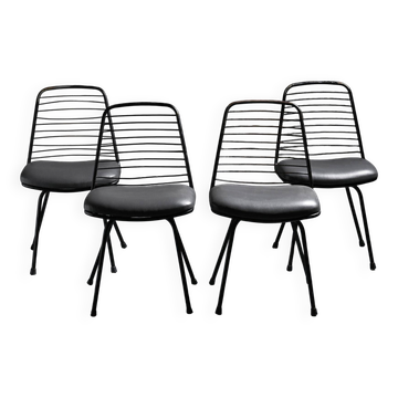 Set of four chairs by Jean-Louis Bonnant, circa 1955.