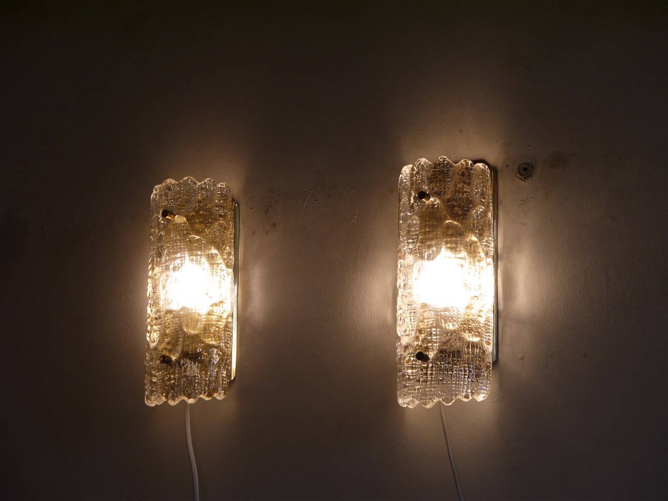 Pair of crystal and brass wall sconces by Carl Fagerlund