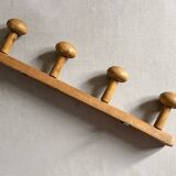 Varnished wooden wall coat rack with 4 hooks, antique item.