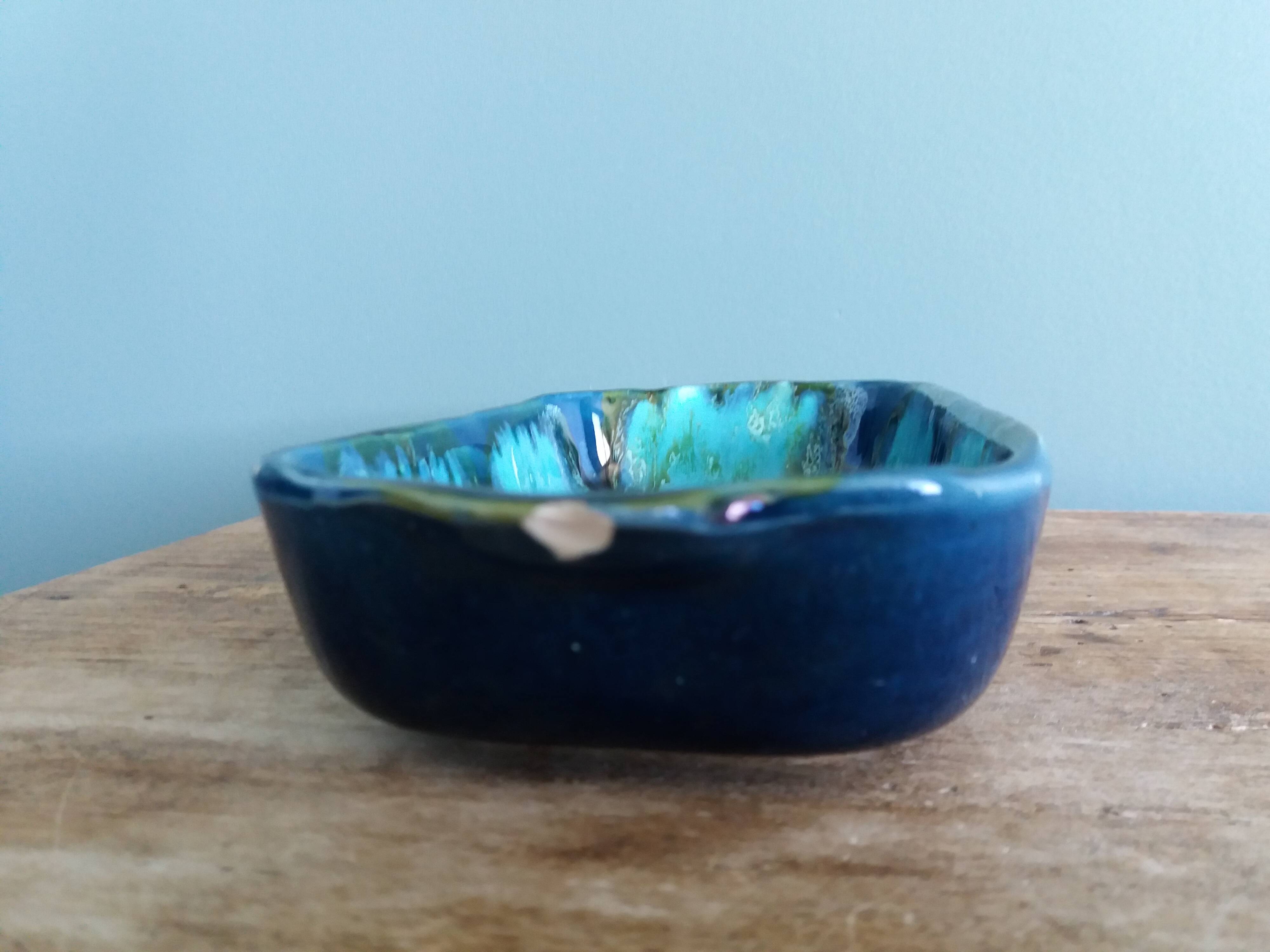 Vallauris stamped pocket emptier in flamed stoneware