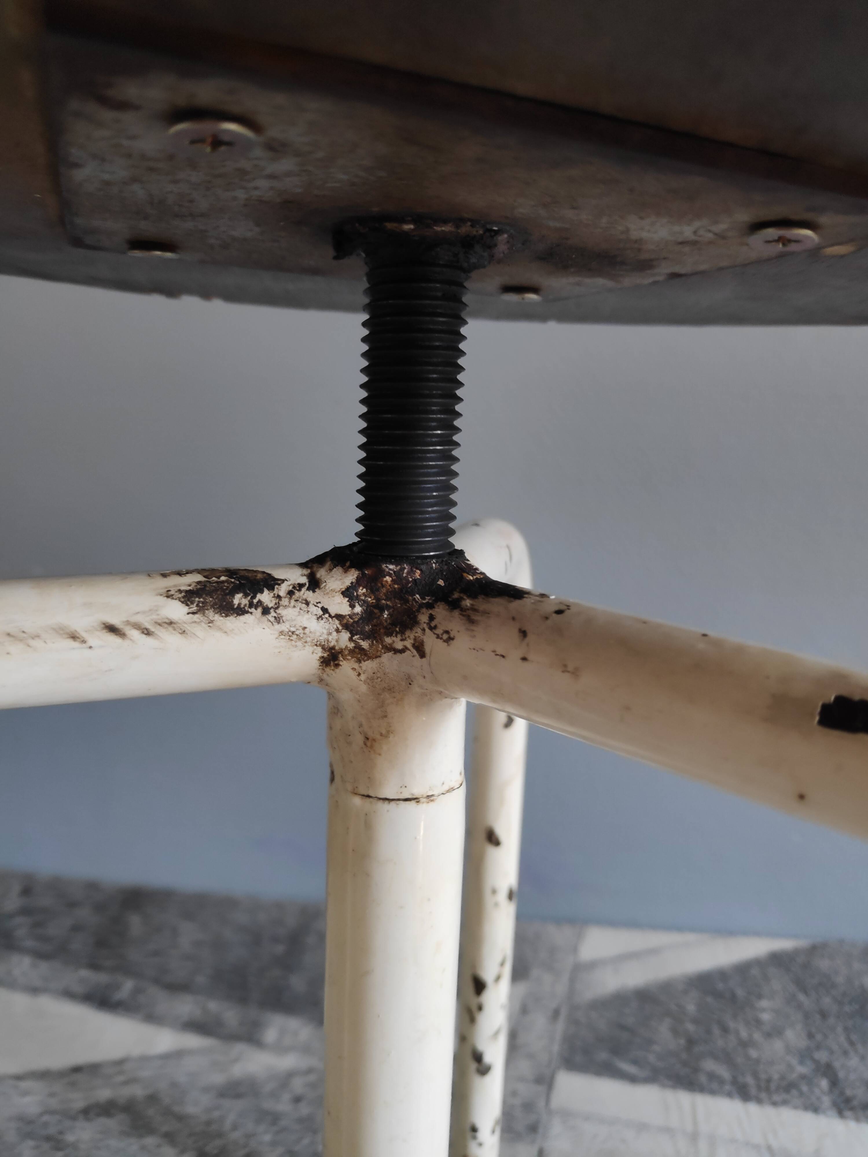 3-foot white metal workshop stool with wood seating threaded axis