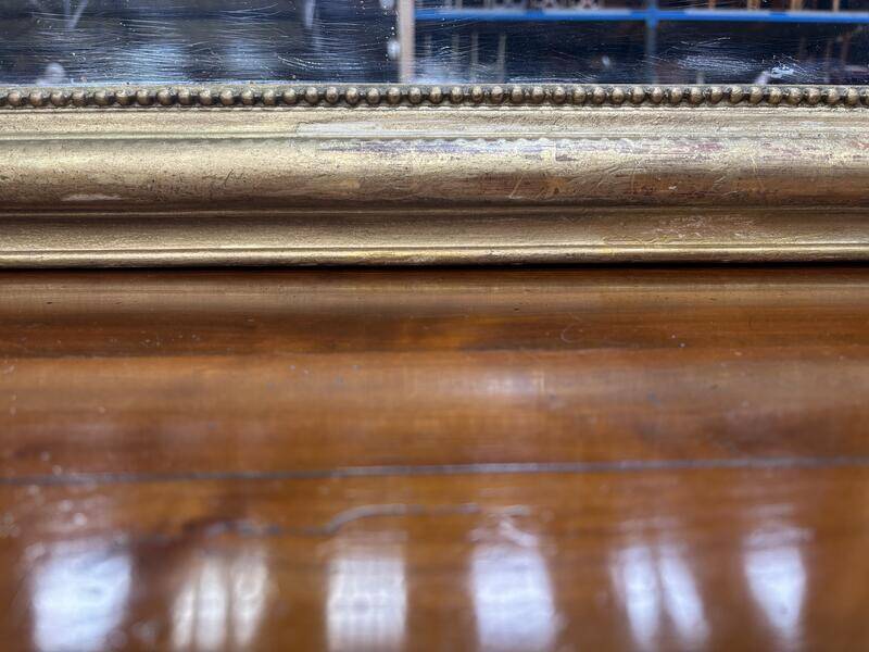 Miroir doré de style Louis XVI