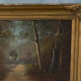 Peinture ancienne paysage sous bois signé.
