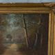 Old signed landscape painting under wood.