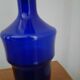 Set liquor bottle with candle holder