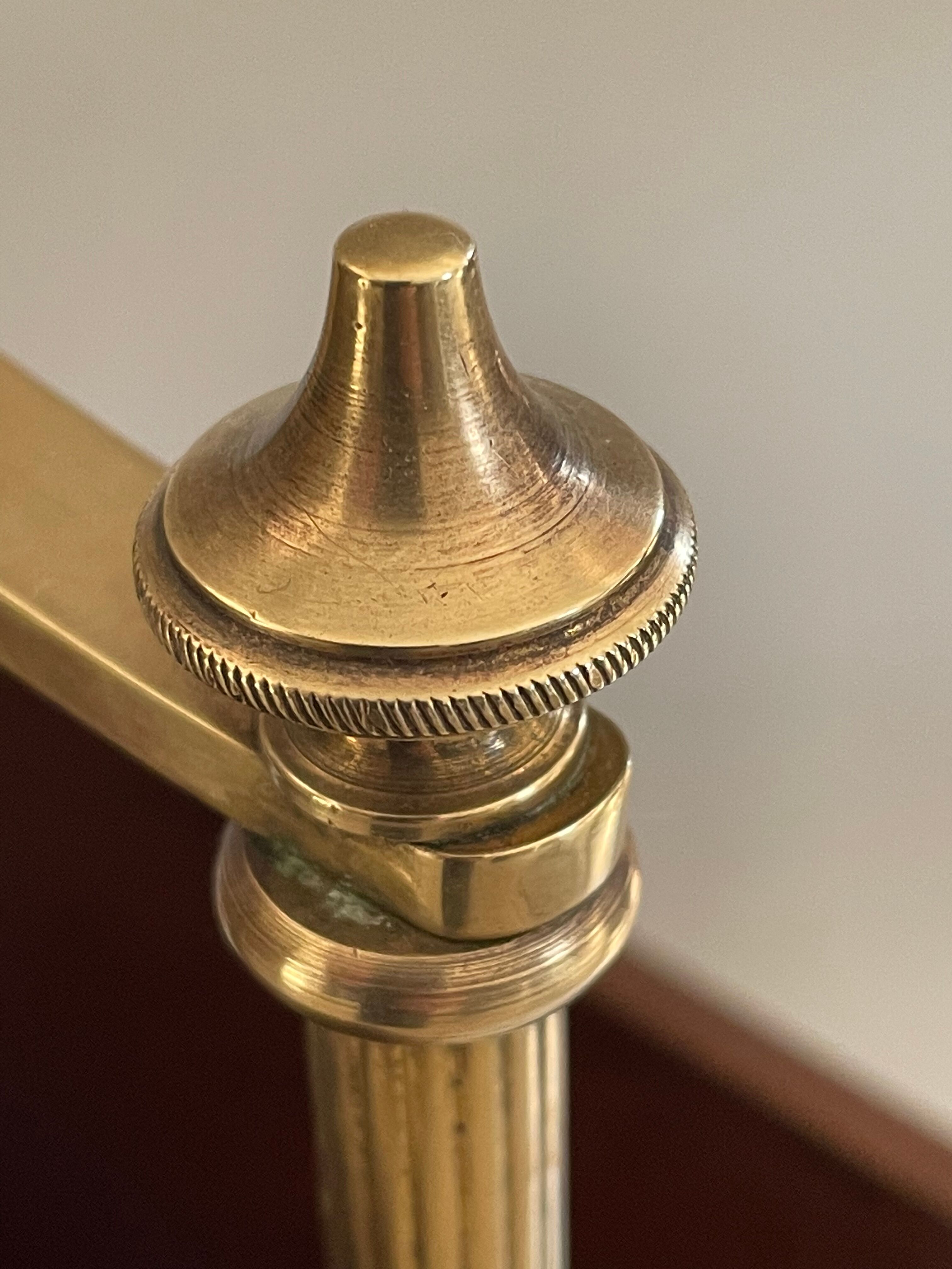 Magazine racks with claw feet by Maison Jansen