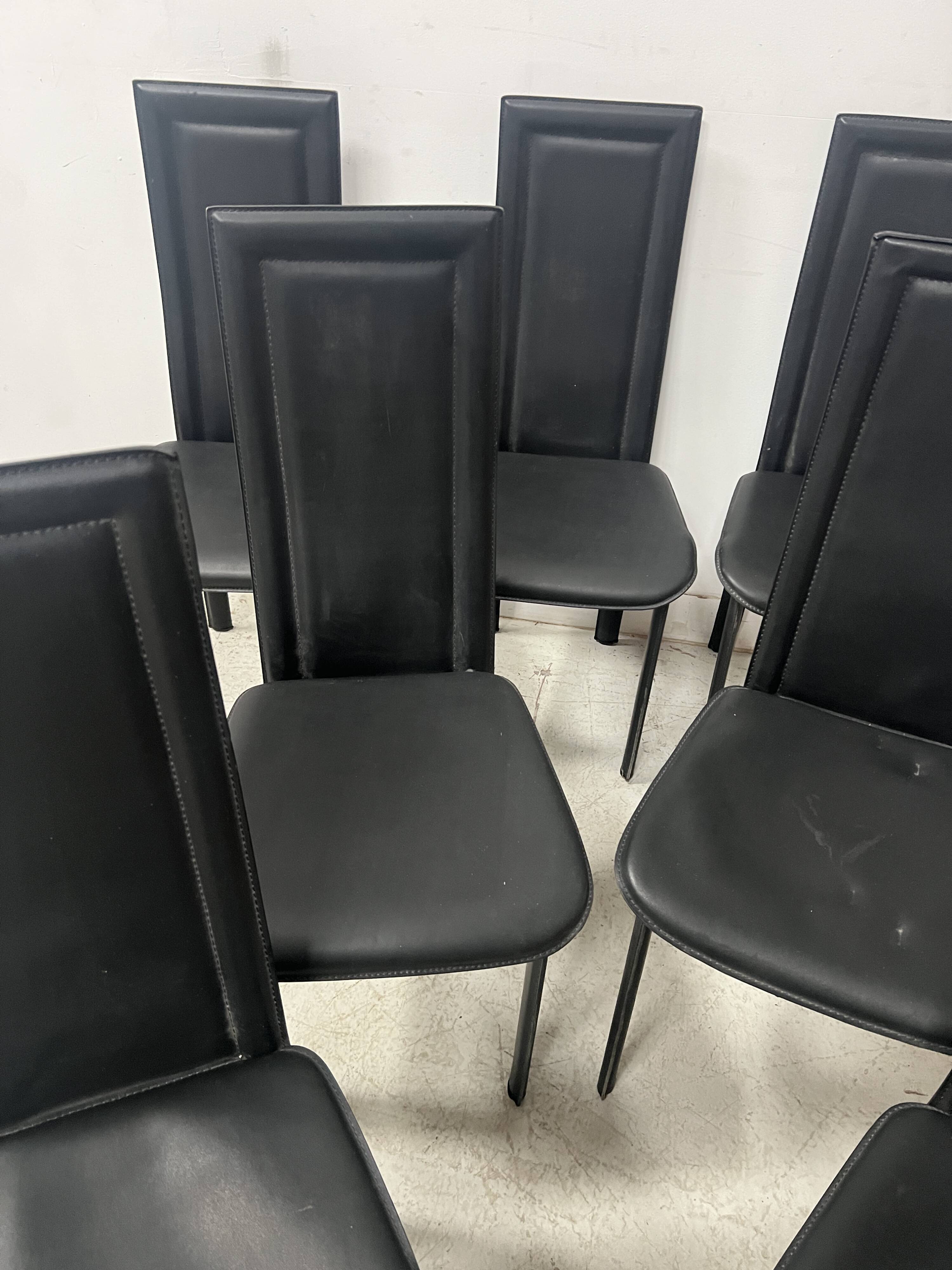 Set of eight designer chairs in black leather from the 20th century